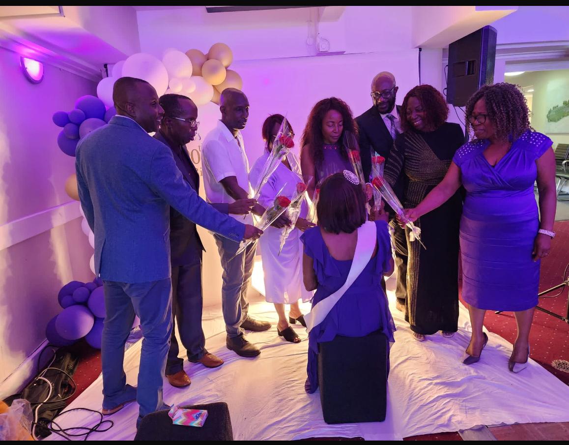 All 8 siblings presenting roses to Zetilda